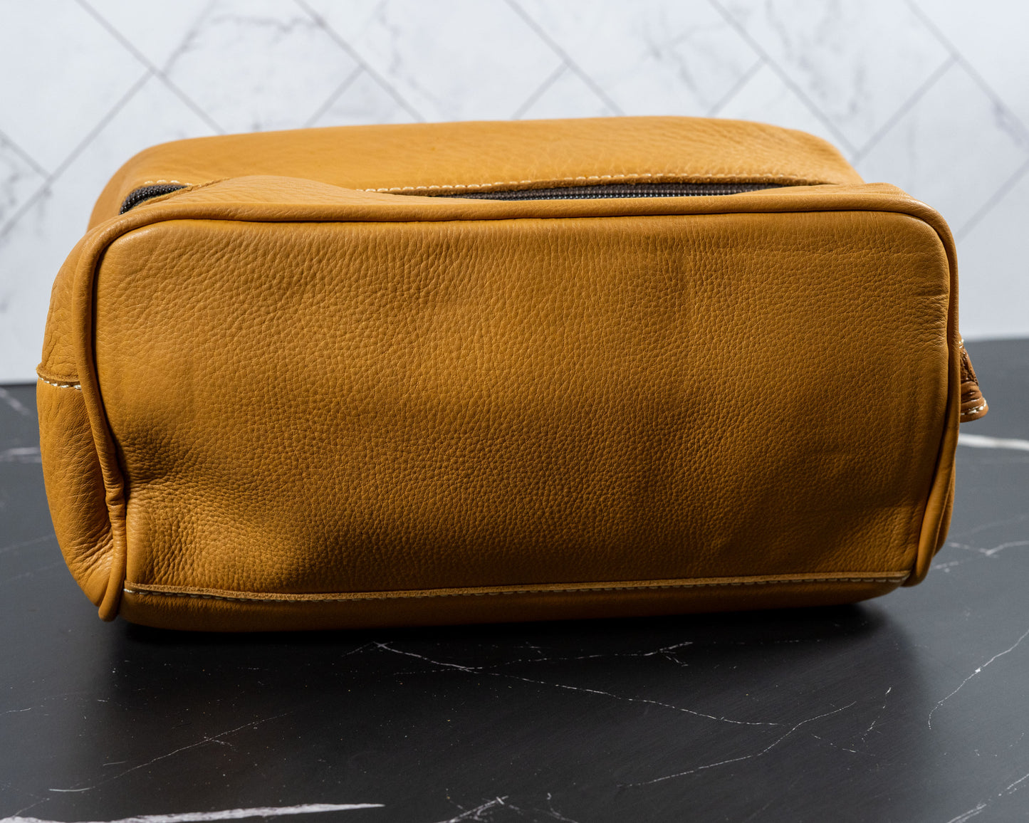 Hand-tooled cowhide toiletry travel bag, interior view