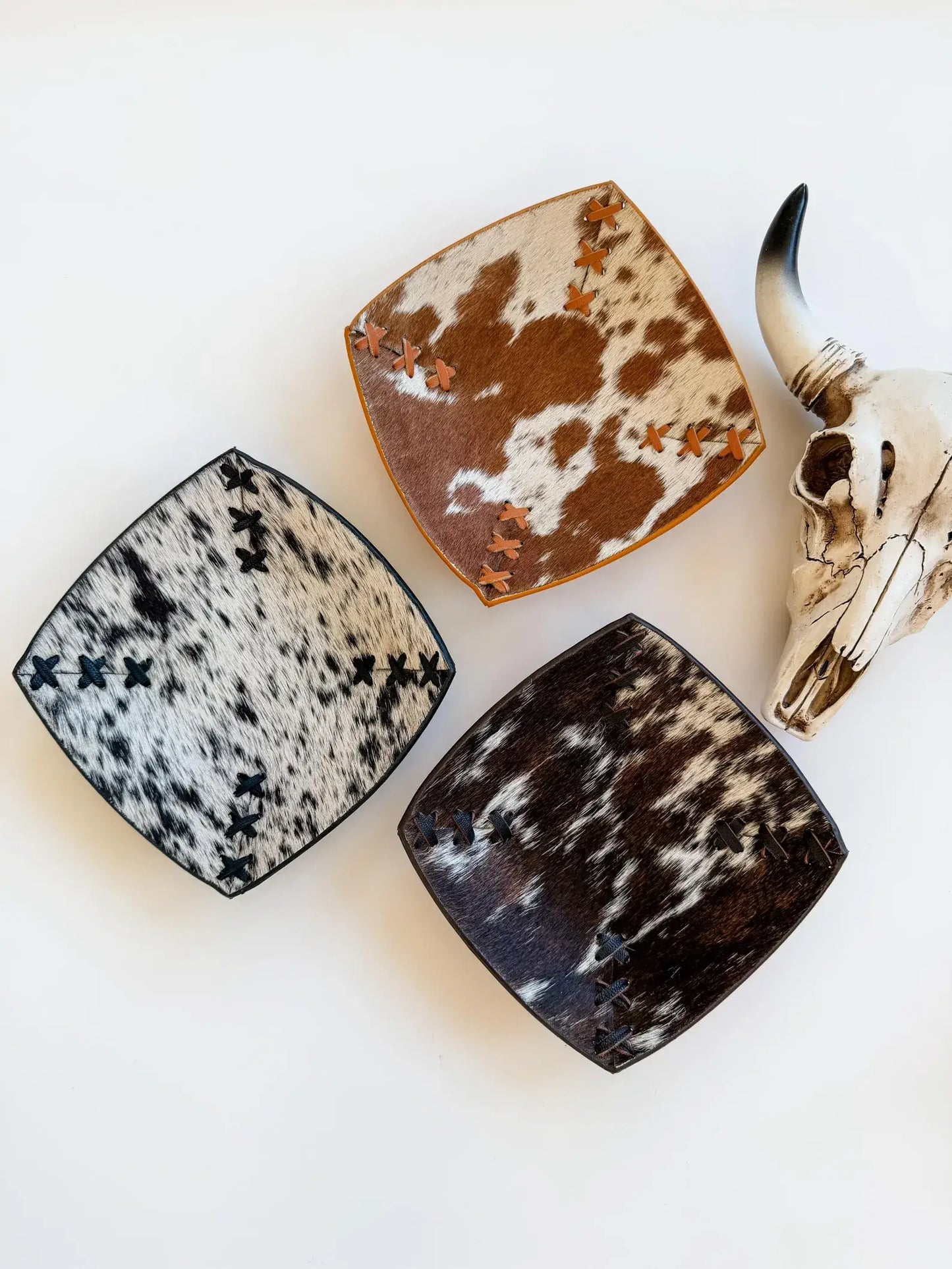 Cowhide and leather catch-all tray, styled view