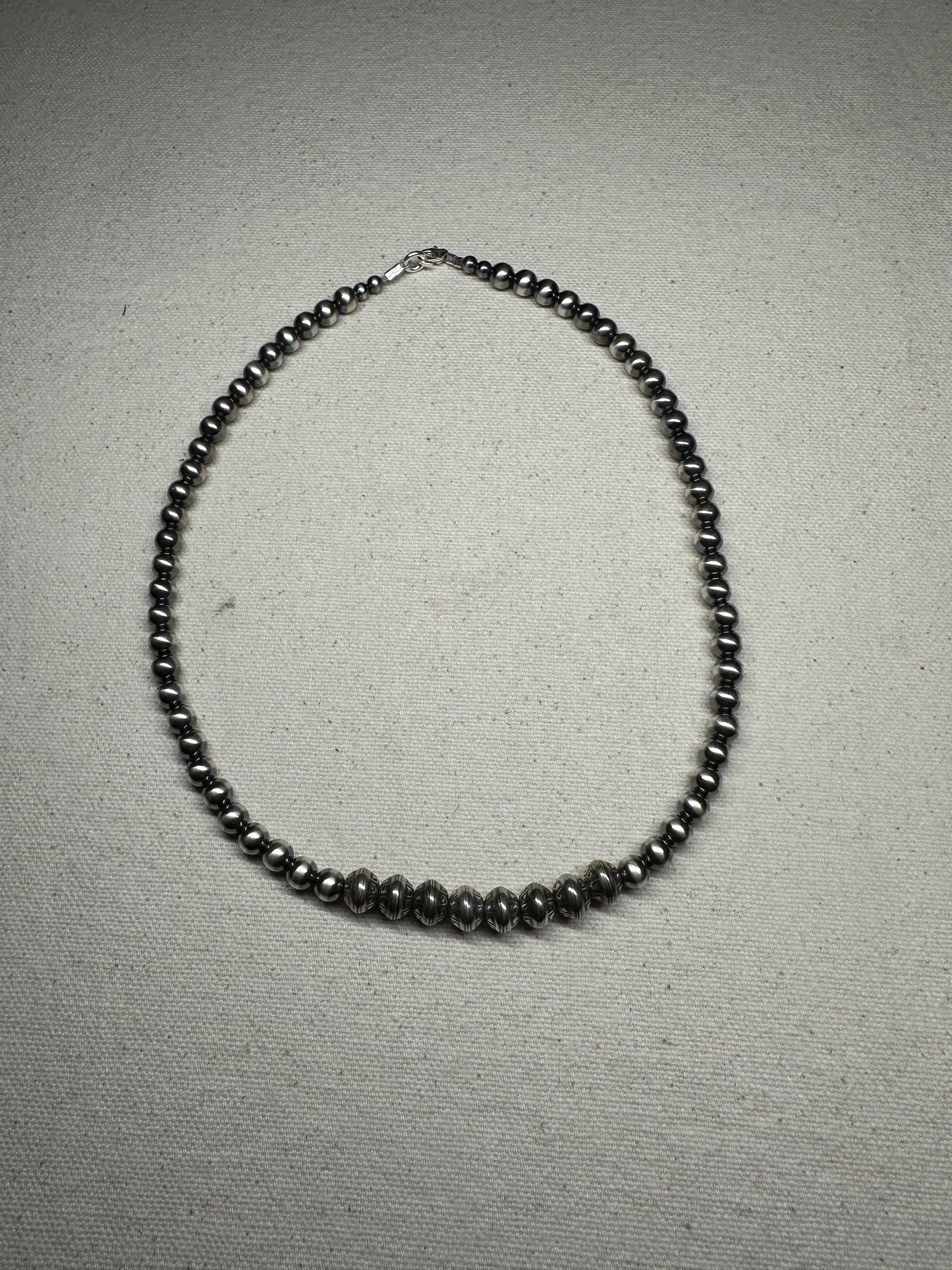 Sterling silver pearl necklace with southwest stamped pearls, 16.5 inches