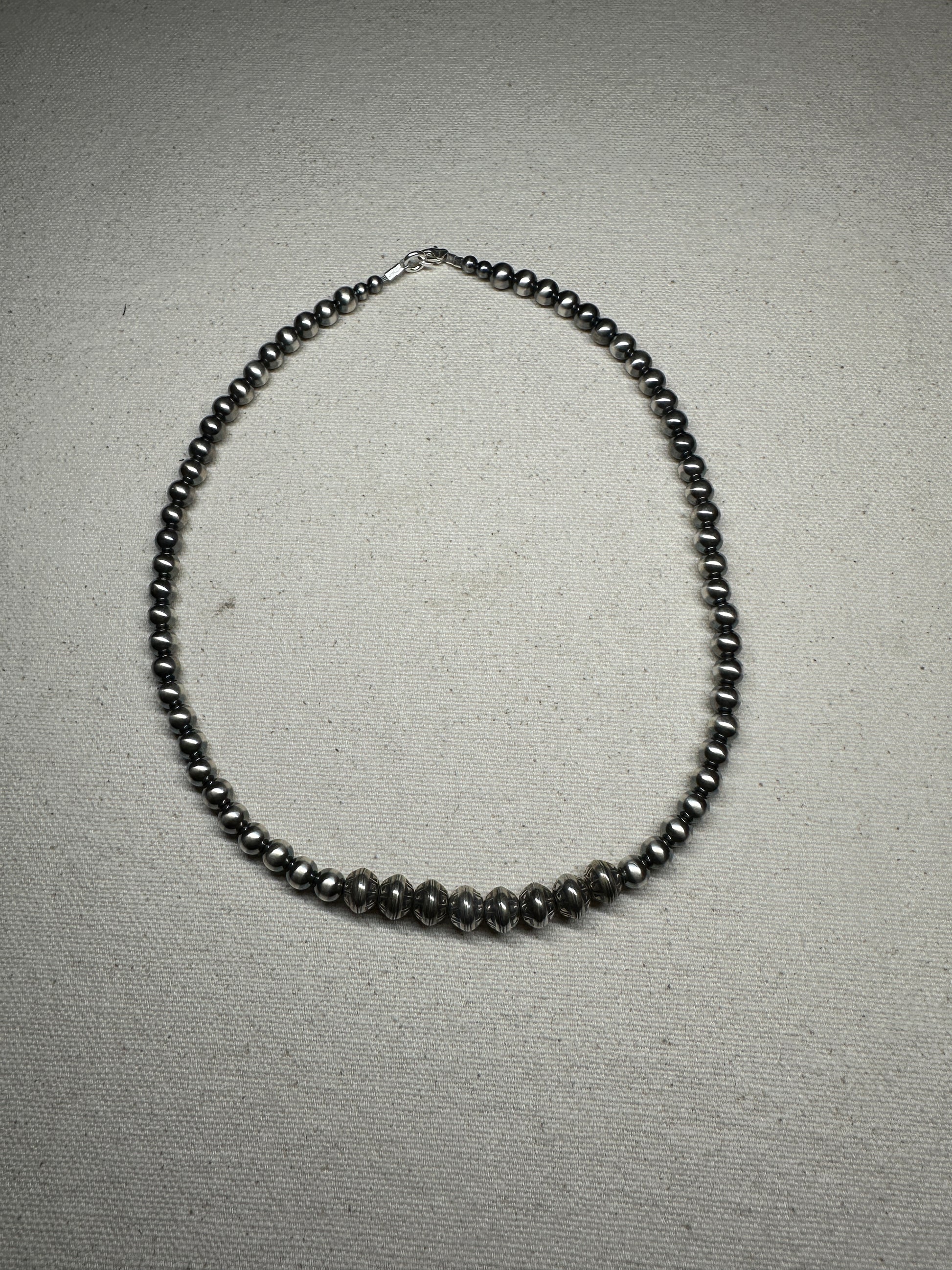Sterling silver pearl necklace with southwest stamped pearls, 16.5 inches