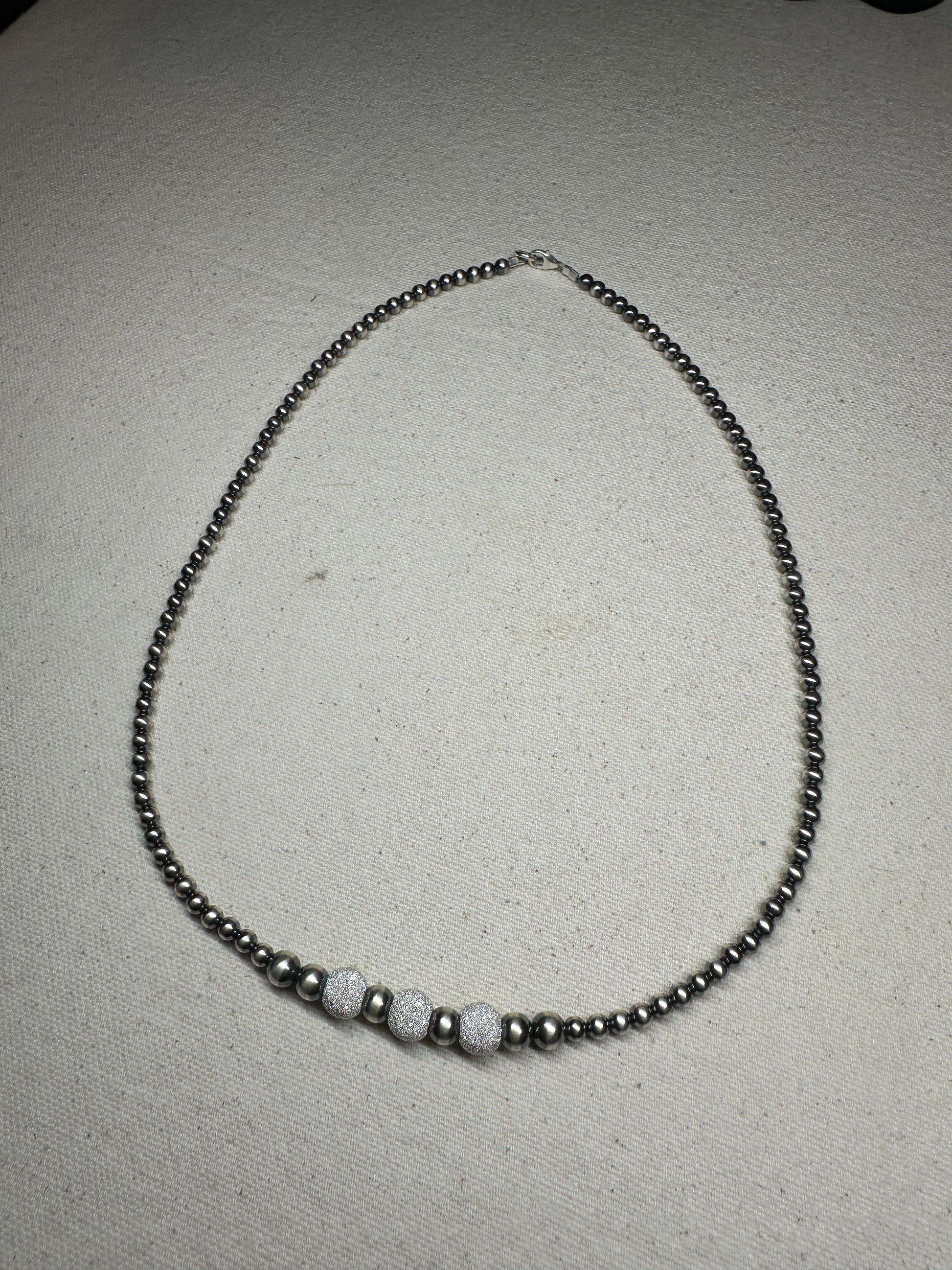 Sterling silver pearl necklace with shimmery pearl accents, 19.5 inches