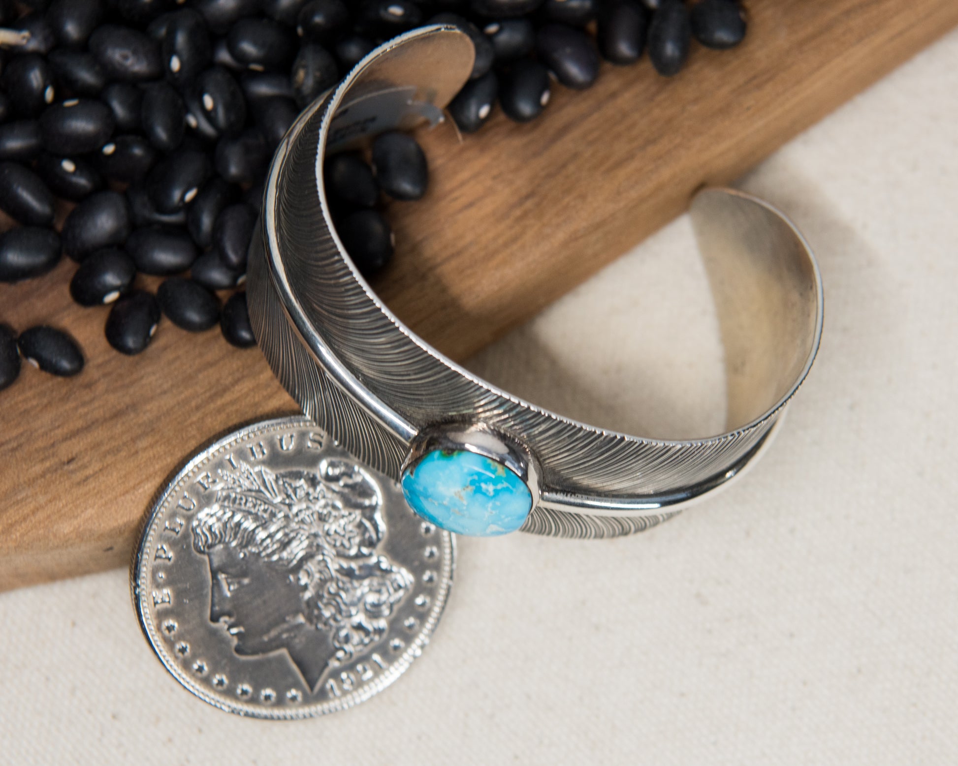 Kingman turquoise stamped feather cuff, additional view