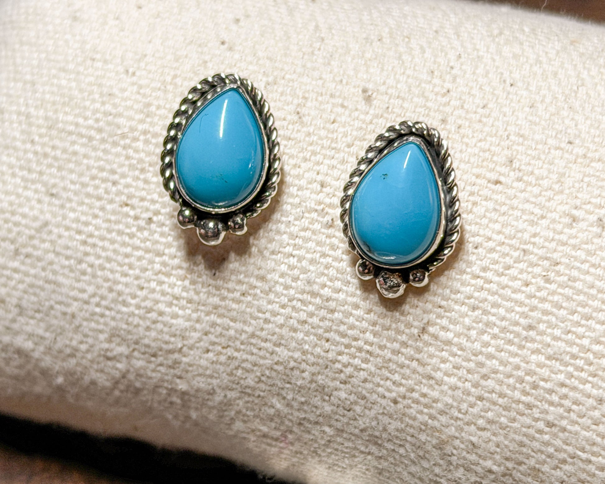 Pear shape turquoise stud earrings, detail view