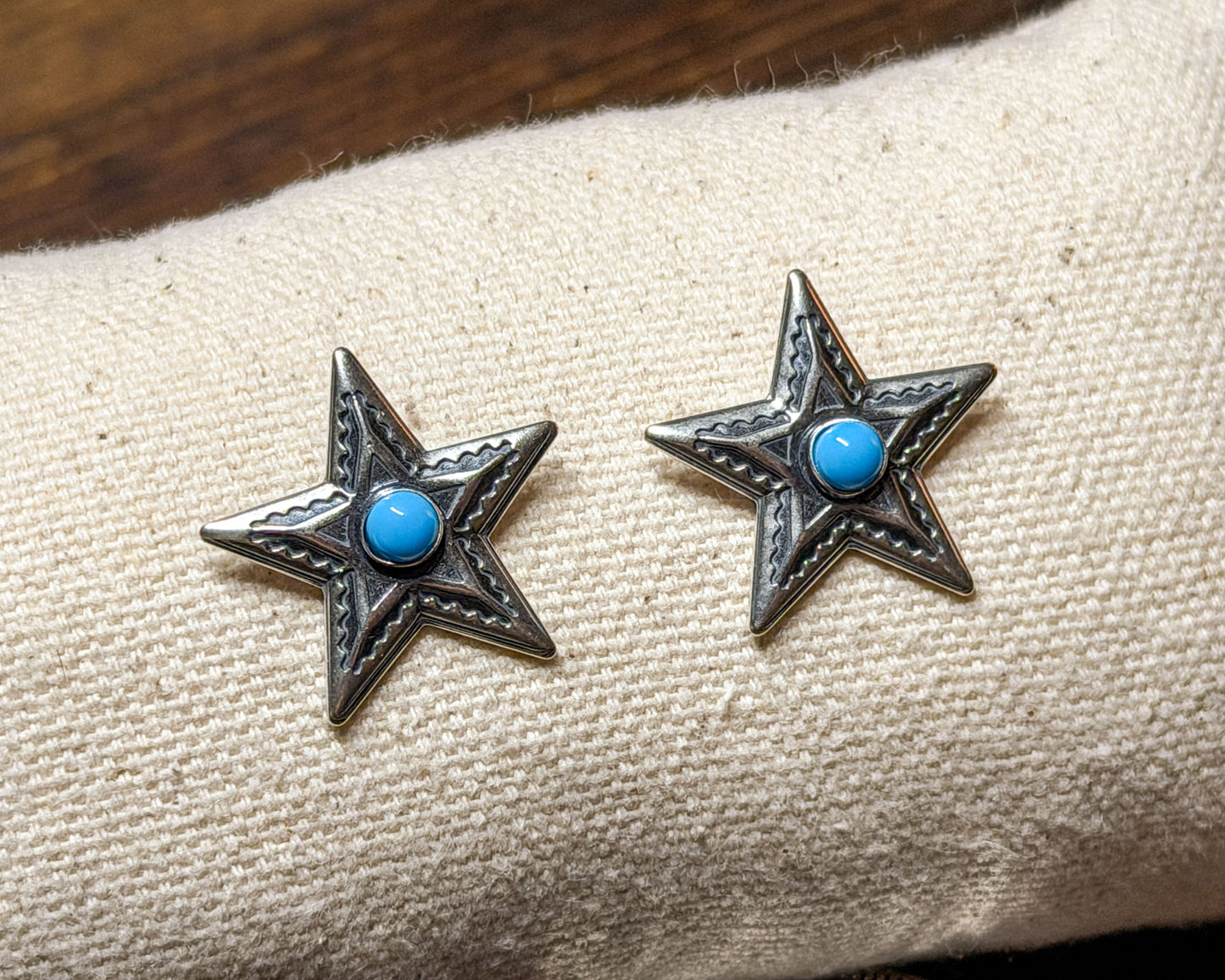 Turquoise star earrings, detail view
