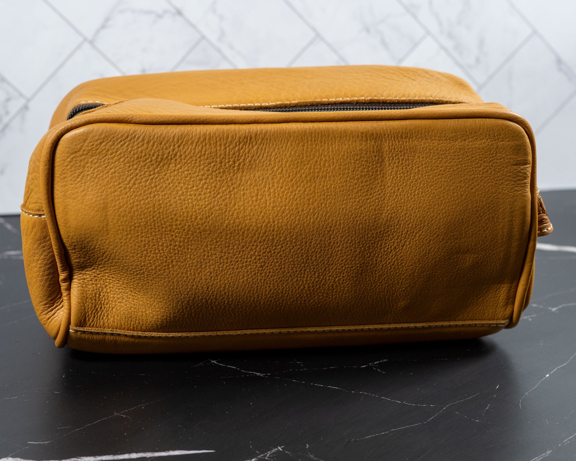 Hand-tooled cowhide toiletry travel bag, interior view