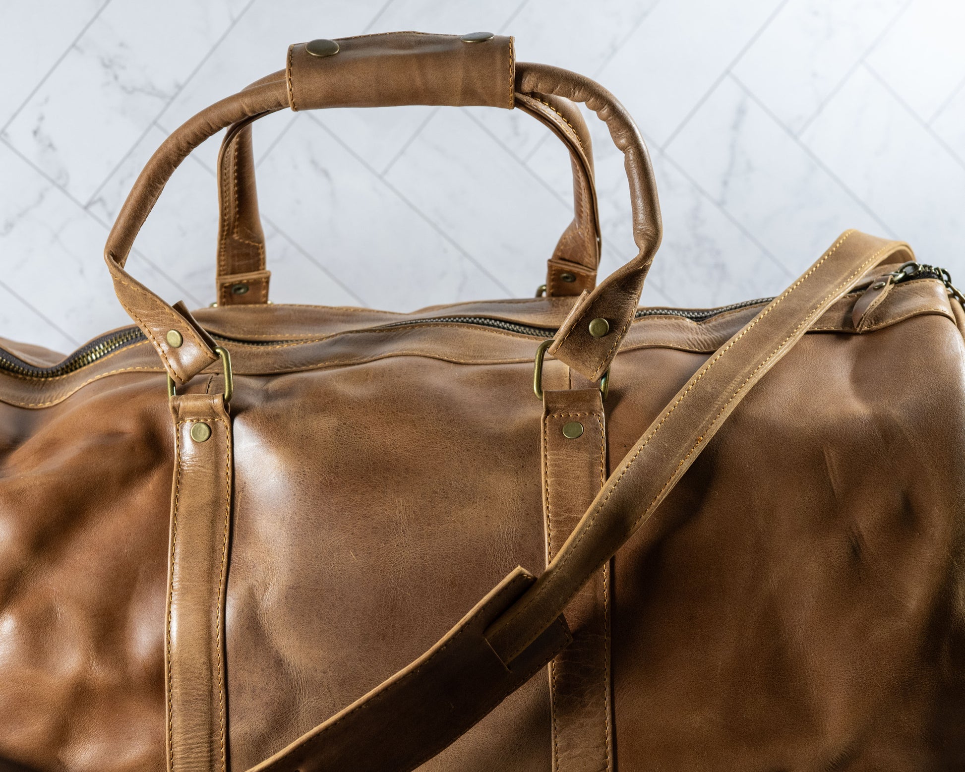Genuine leather duffle travel bag, side view