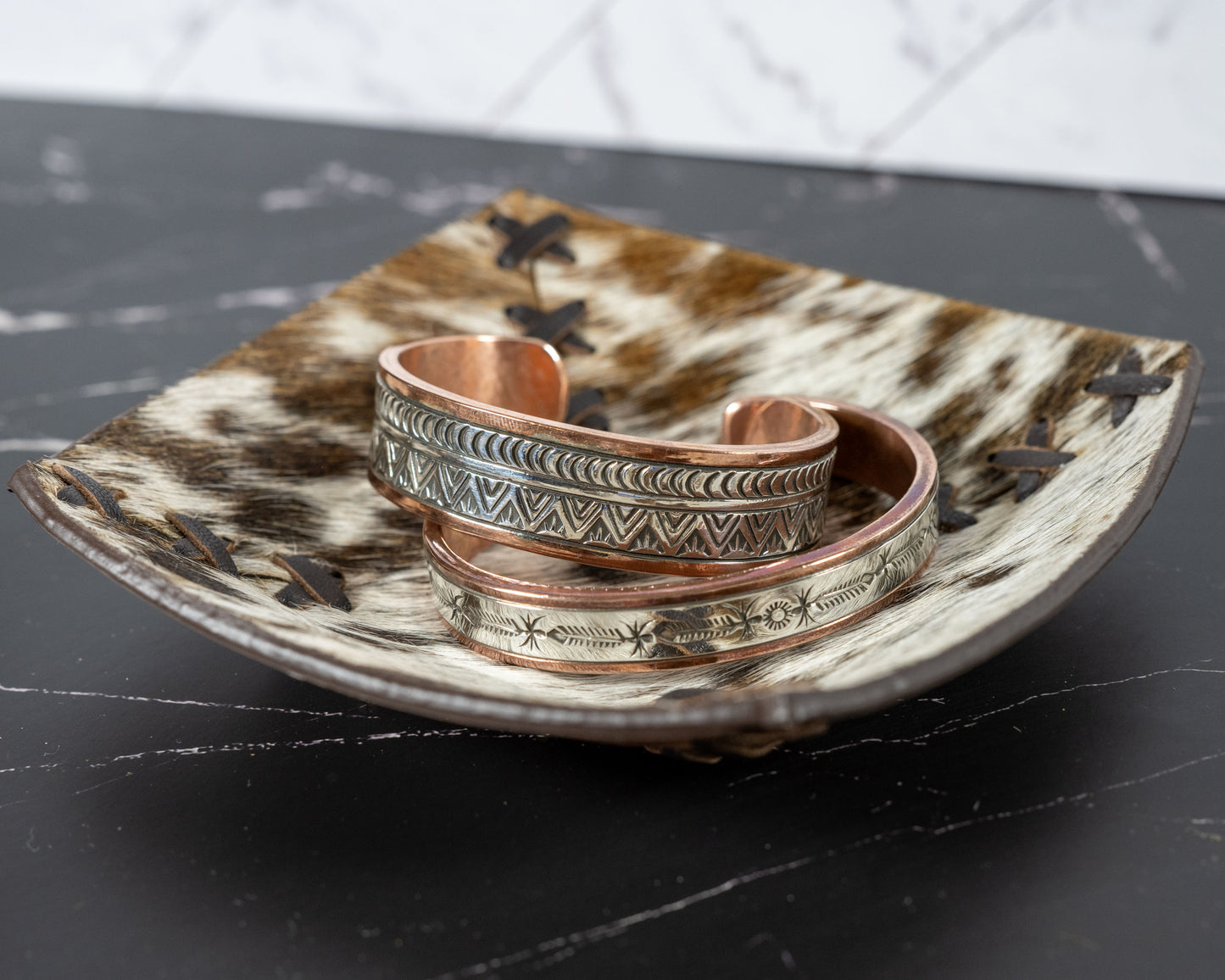 Cowhide and leather catch-all tray for jewelry storage
