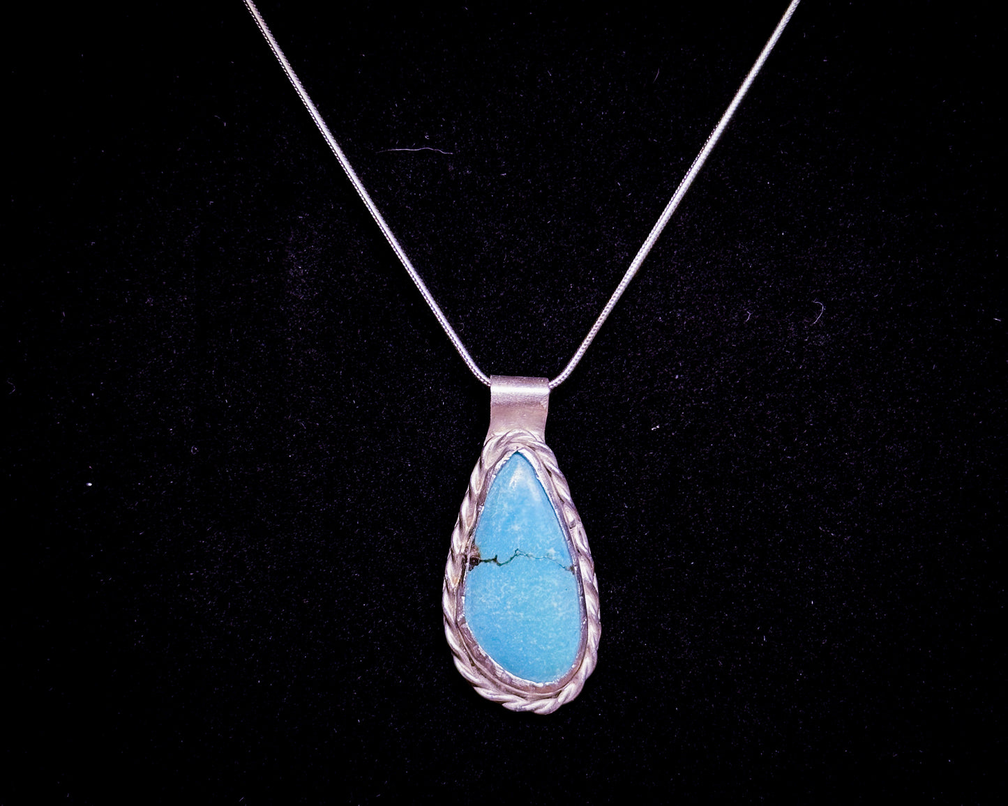 Heritage Stones Collection turquoise pendant displayed on a sterling silver chain